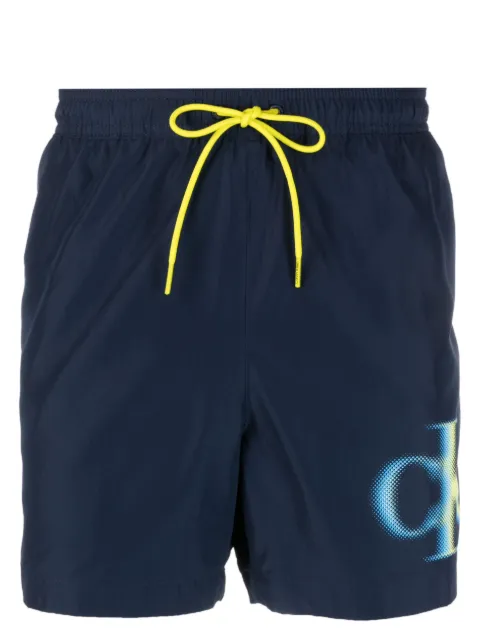 Calvin Klein shorts de playa con logo estampado