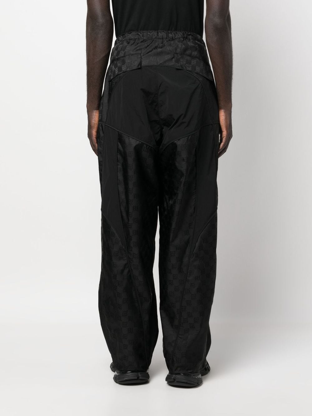 Shop Misbhv Monogram-jacquard Wide-leg Trousers In Black