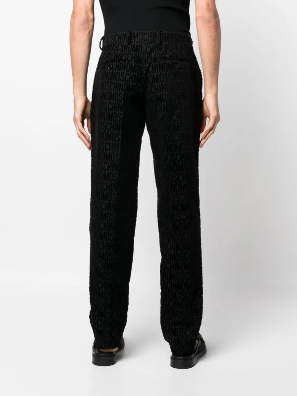 Moschino flocked-logo straight-leg Trousers | Black | FARFETCH
