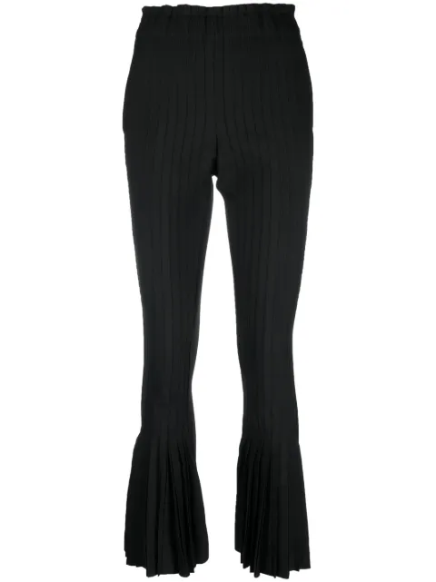 sacai pantalones acampanados con diseño plisado