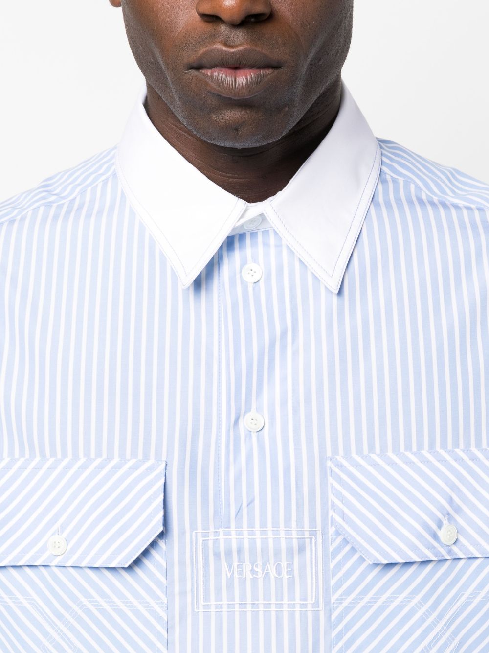 Shop Versace Logo-print Pinstripe Cotton Shirt In Blue