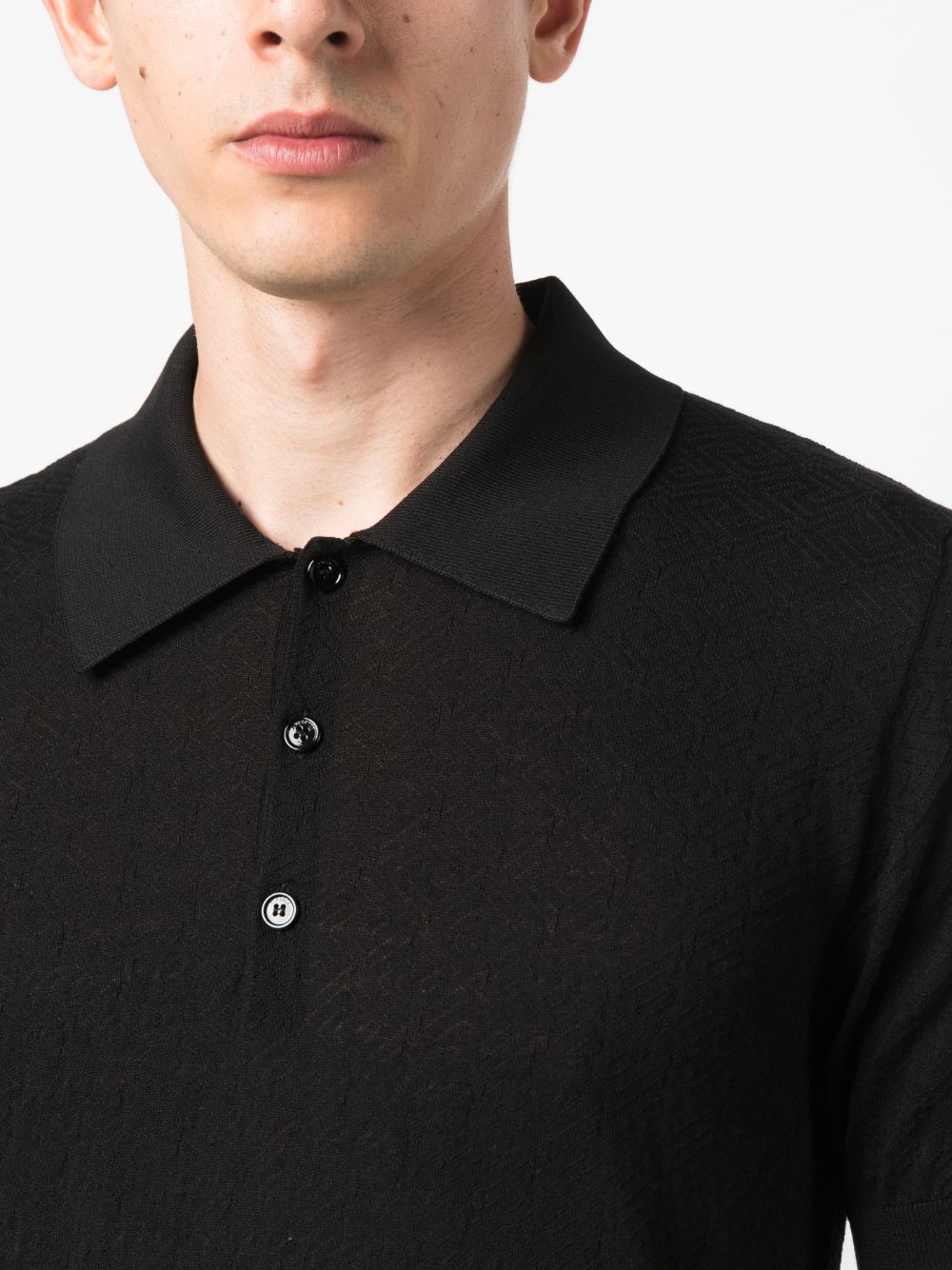 Shop Versace La Greca Pointelle-knit Polo Shirt In Black