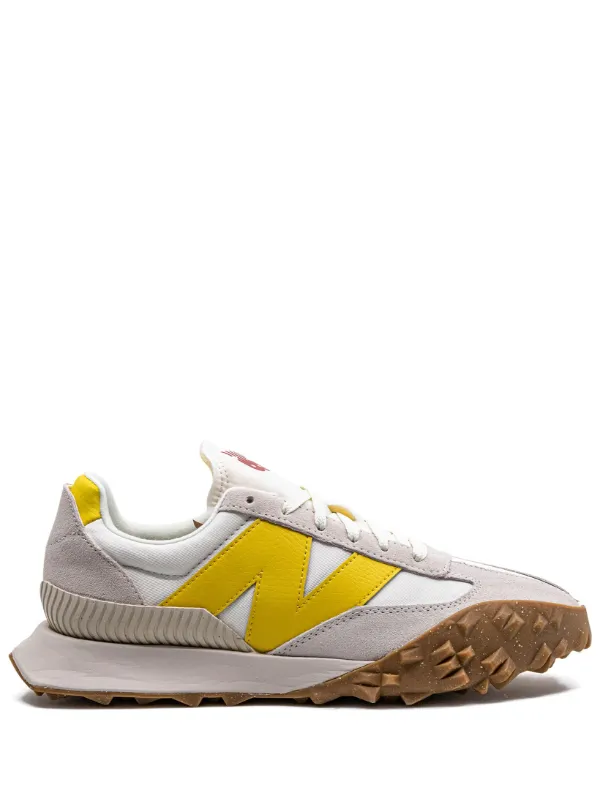 New Balance 327 sneakers in off white with yellow detail