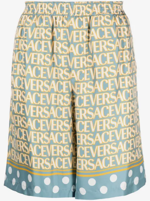 Versace shorts de seda con Versace en toda la pieza