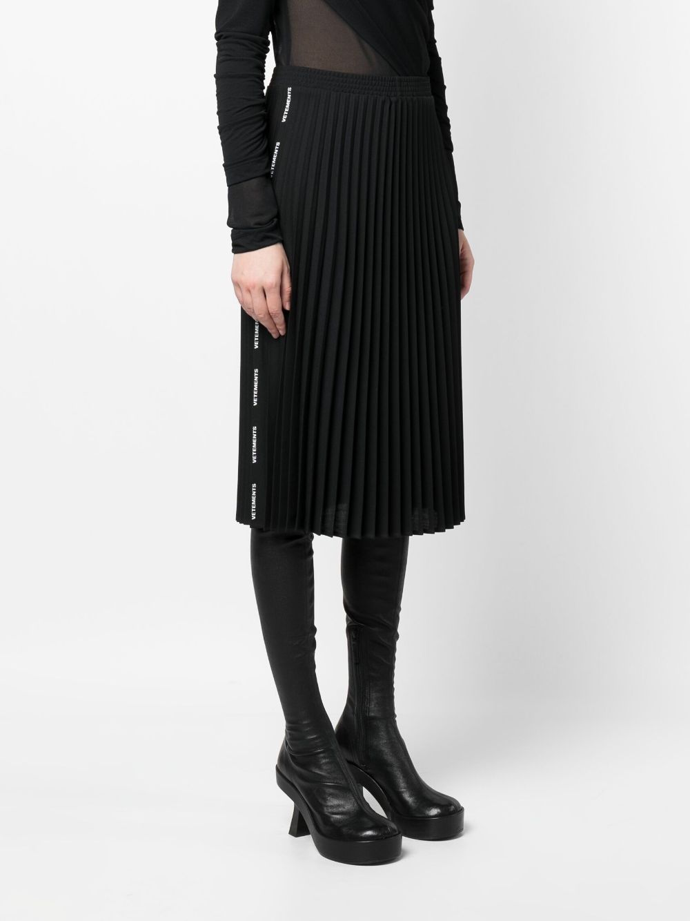 Shop Vetements Knee-length Pleated Skirt In Black