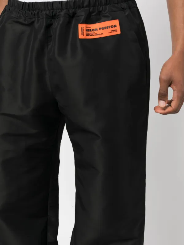 Heron Preston logo-patch wide-leg Trousers | Black | FARFETCH