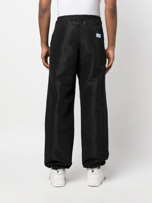 Heron Preston logo-patch wide-leg Trousers | Black | FARFETCH
