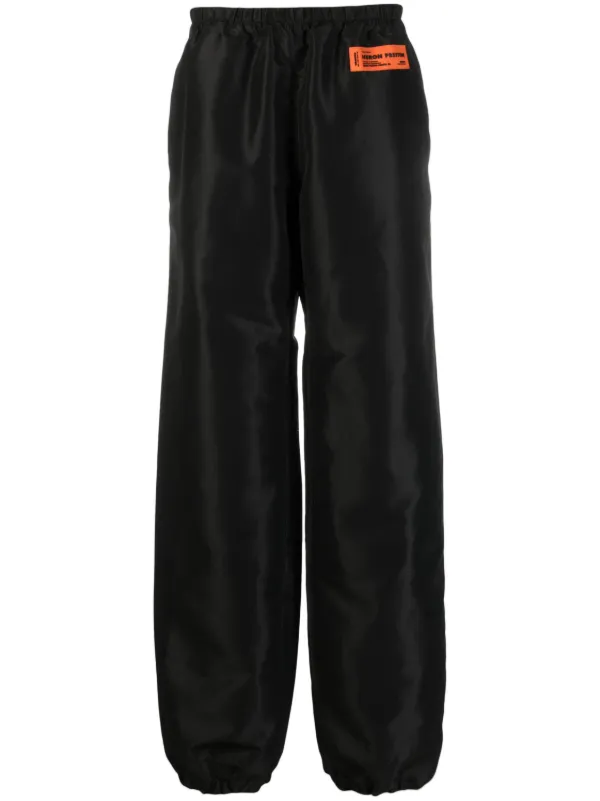 Heron Preston logo-patch wide-leg Trousers | Black | FARFETCH