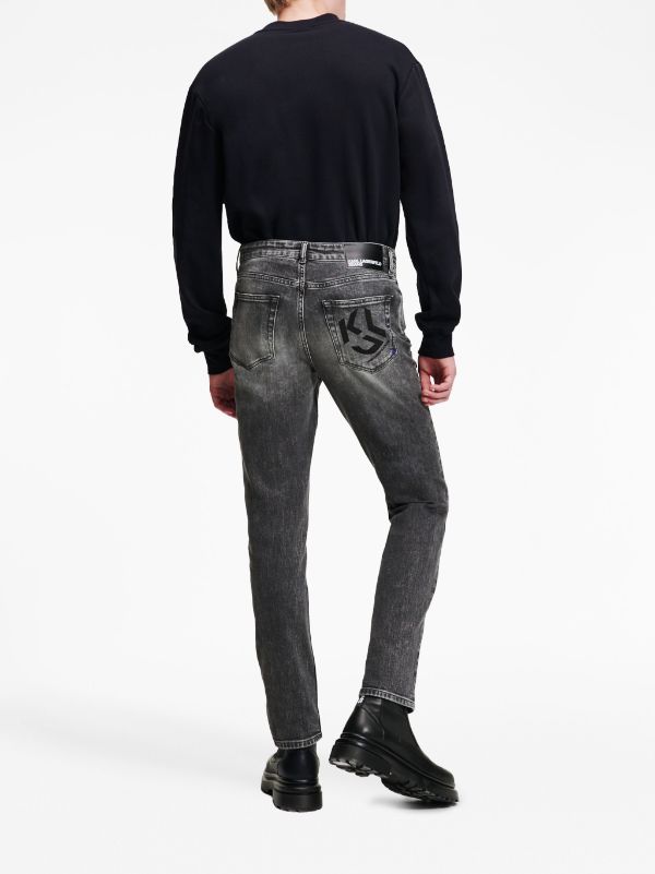 monogram-print slim-cut jeans