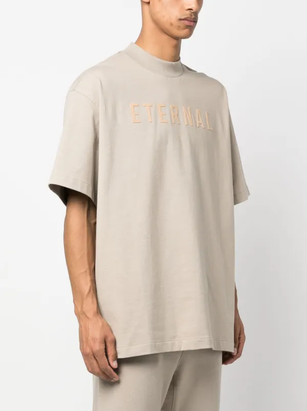 Fear Of God Eternal logo-flocked Cotton T-Shirt - Farfetch