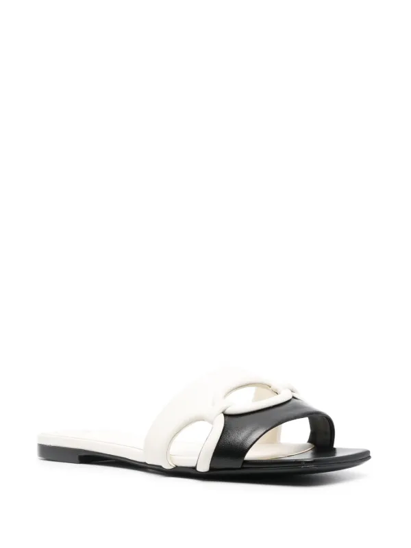 VALENTINO GARAVANI ◆ Chain 1967 Leather Sandal 1967 embellished leather chain mules in silver - Valentino