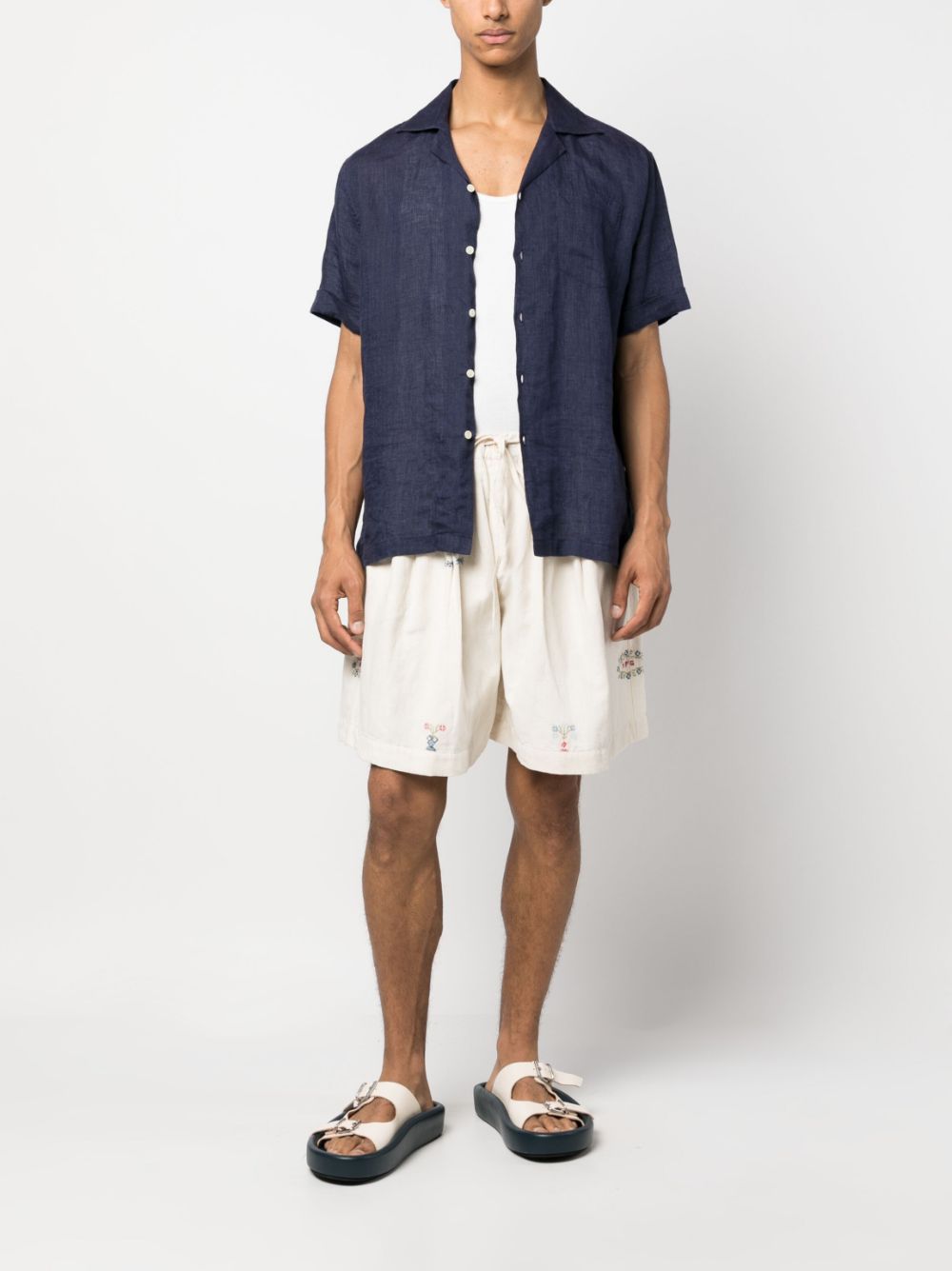STORY mfg. embroidered-design drop-crotch shorts - Beige