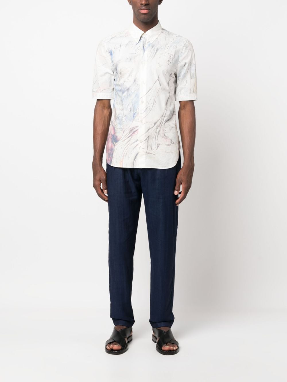 Shop Kiton Pleated Tapered-leg Trousers In Blue