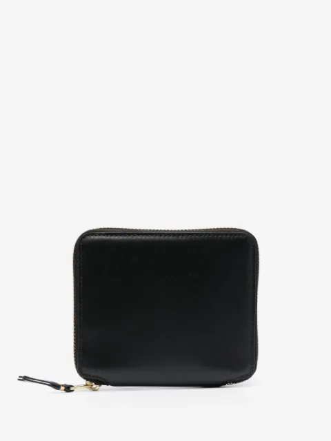 Comme Des Garçons Wallet portefeuille en cuir à slogan imprimé