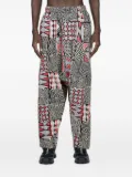 Engineered Garments patchwork pleated trousers - Black