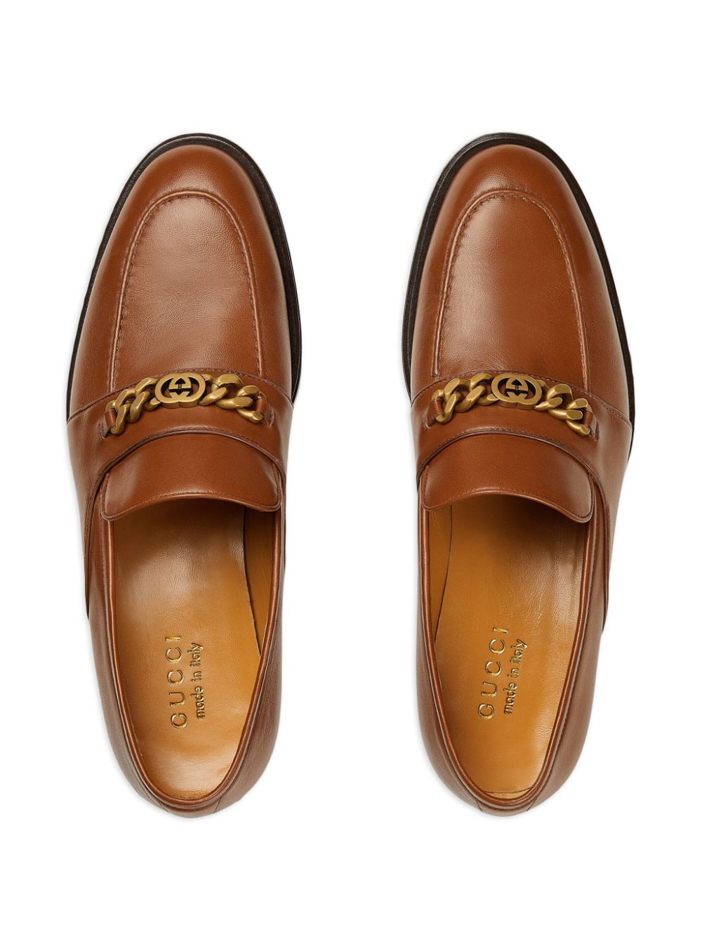 Shop Gucci Logo-chain Leather Loafers In Brown