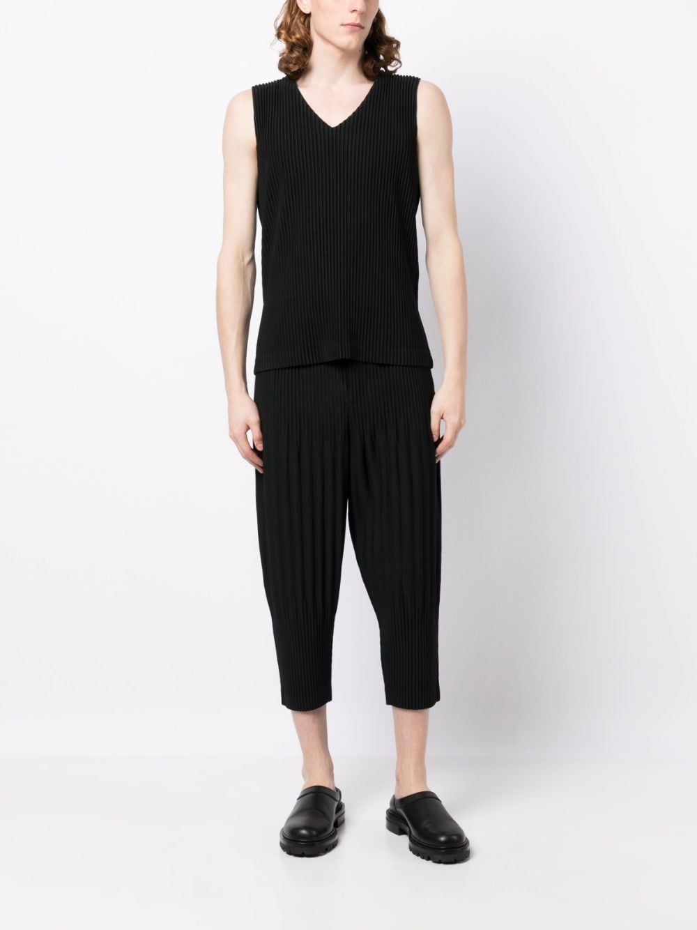 Shop Issey Miyake Plissé Cropped Drop-crotch Trousers In Black