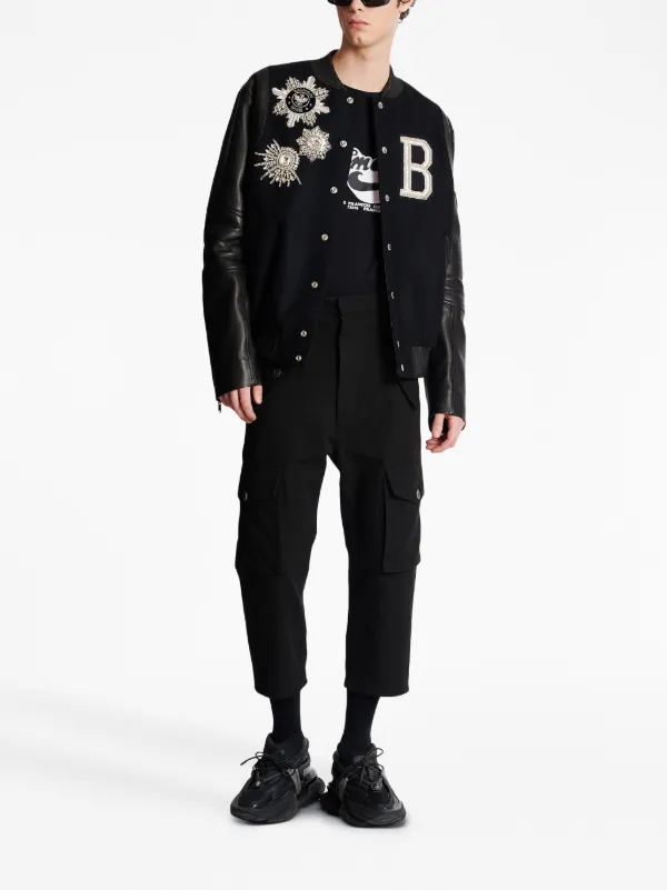 Balmain 70s logo-print T-shirt | Black | FARFETCH