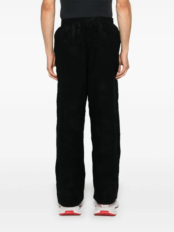 Balenciaga crinkled-effect Track Pants | Black | FARFETCH