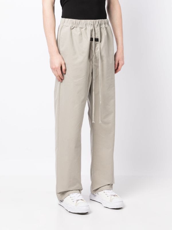 FEAR OF GOD ESSENTIALS logo-patch straight-leg Trousers - Farfetch