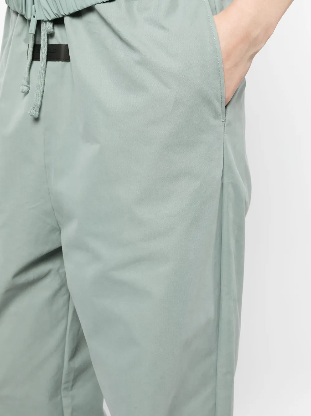 FEAR OF GOD ESSENTIALS Broek met trekkoordtaille Groen