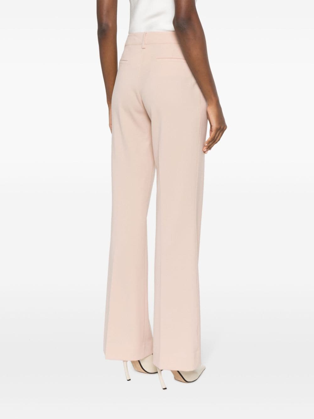 Shop P.a.r.o.s.h Pressed-crease Textured Flared Trousers In Pink