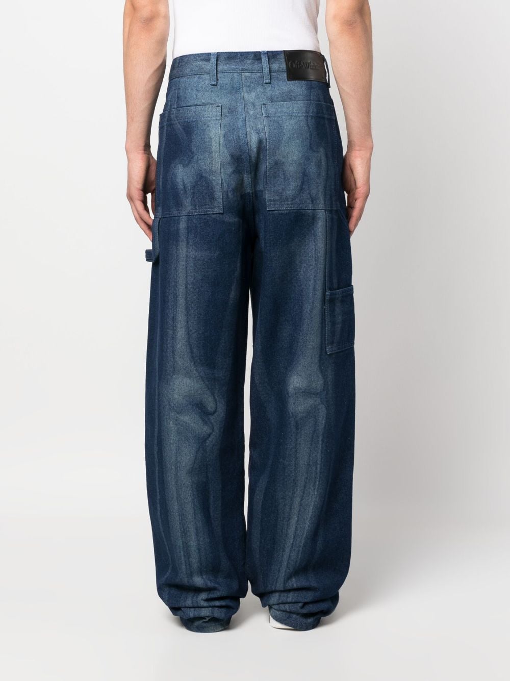 Shop Off-white Mid-rise Skeleton-print Wide-leg Jeans In Blau