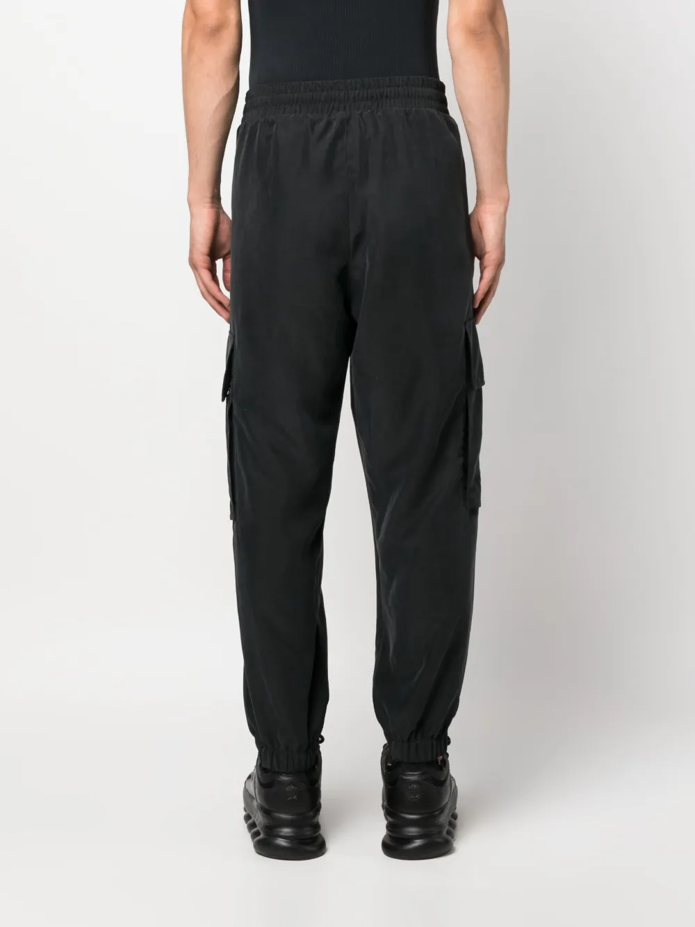 Shop Balmain Embossed-logo Modal-blend Cargo Pants In Black