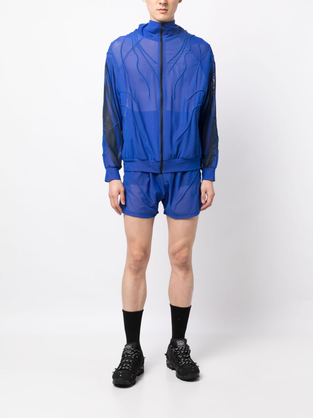 Shop Olly Shinder Semi-sheer Track Shorts In Blue