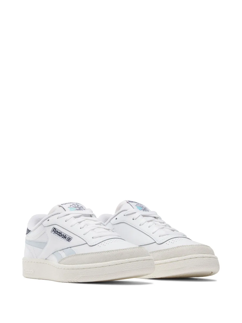 Reebok revenge plus trainers in off best sale white with navy stripe