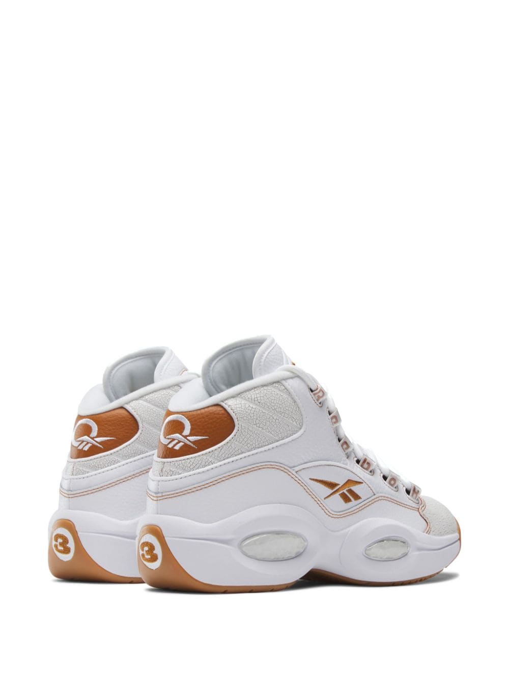 Shop Reebok Question Mid-top Sneakers In White