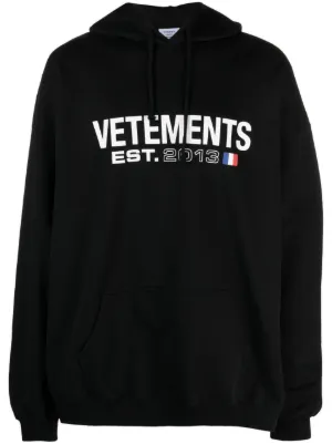 VETEMENTS Translation logo-print Hoodie - Farfetch