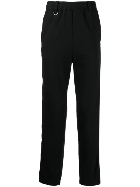Undercover pantalones rectos con parche del logo