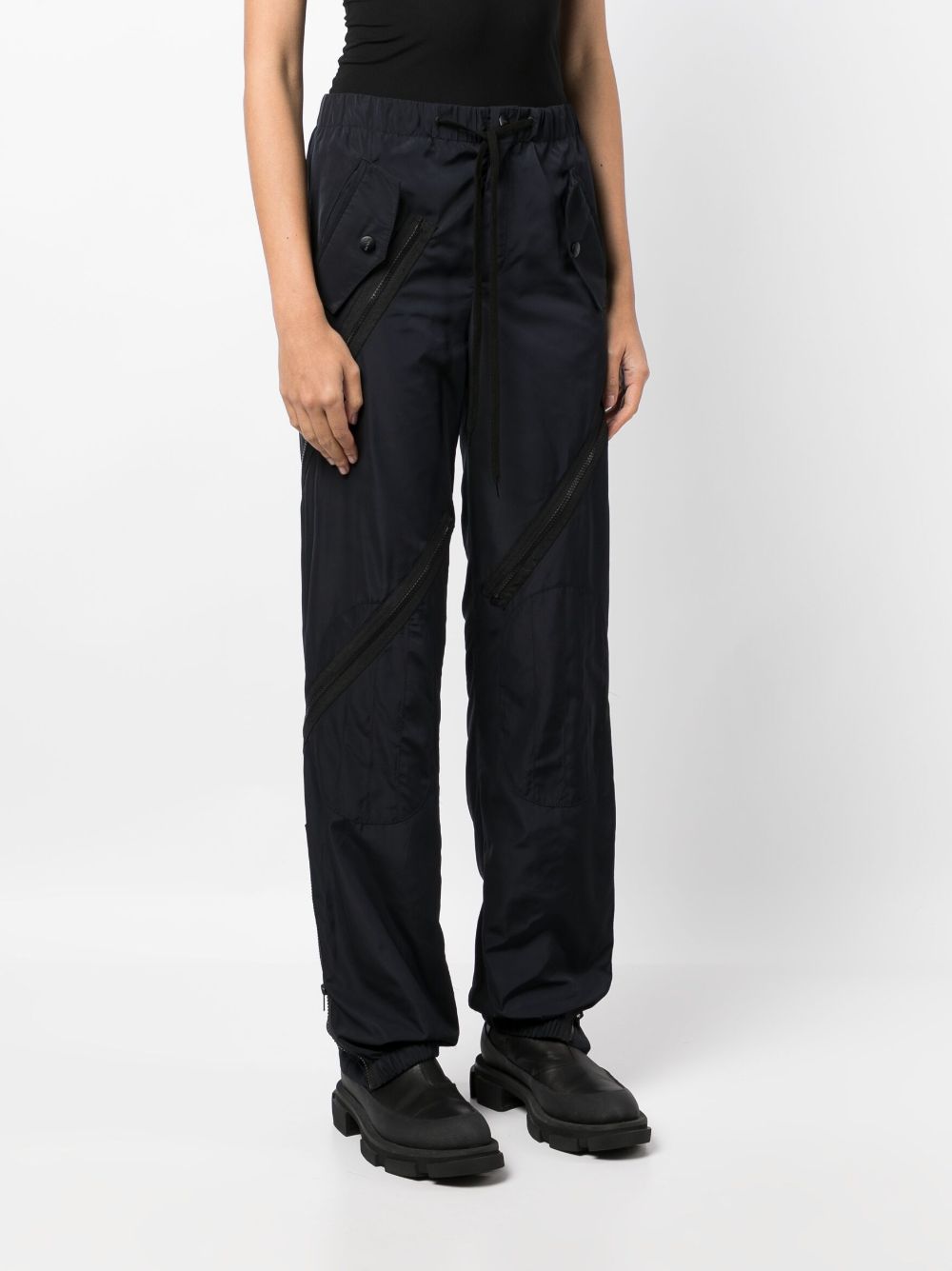 Shop Monse Multi-zip Drawstring-waist Trousers In Black
