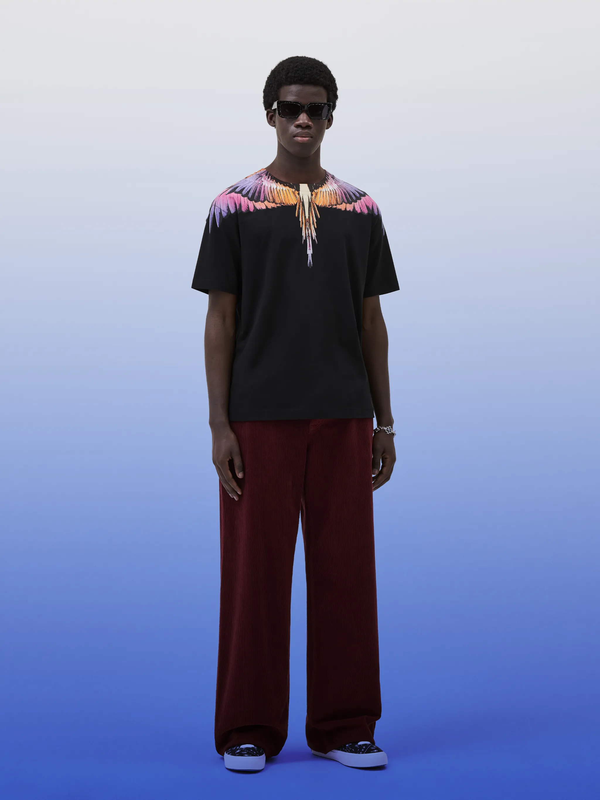 Icon Wings printed cotton T-shirt from Marcelo Burlon County of Milan featuring black/multicolour, cotton, signature Marcelo Burlon Wings print, crew neck, short sleeves and straight hem.