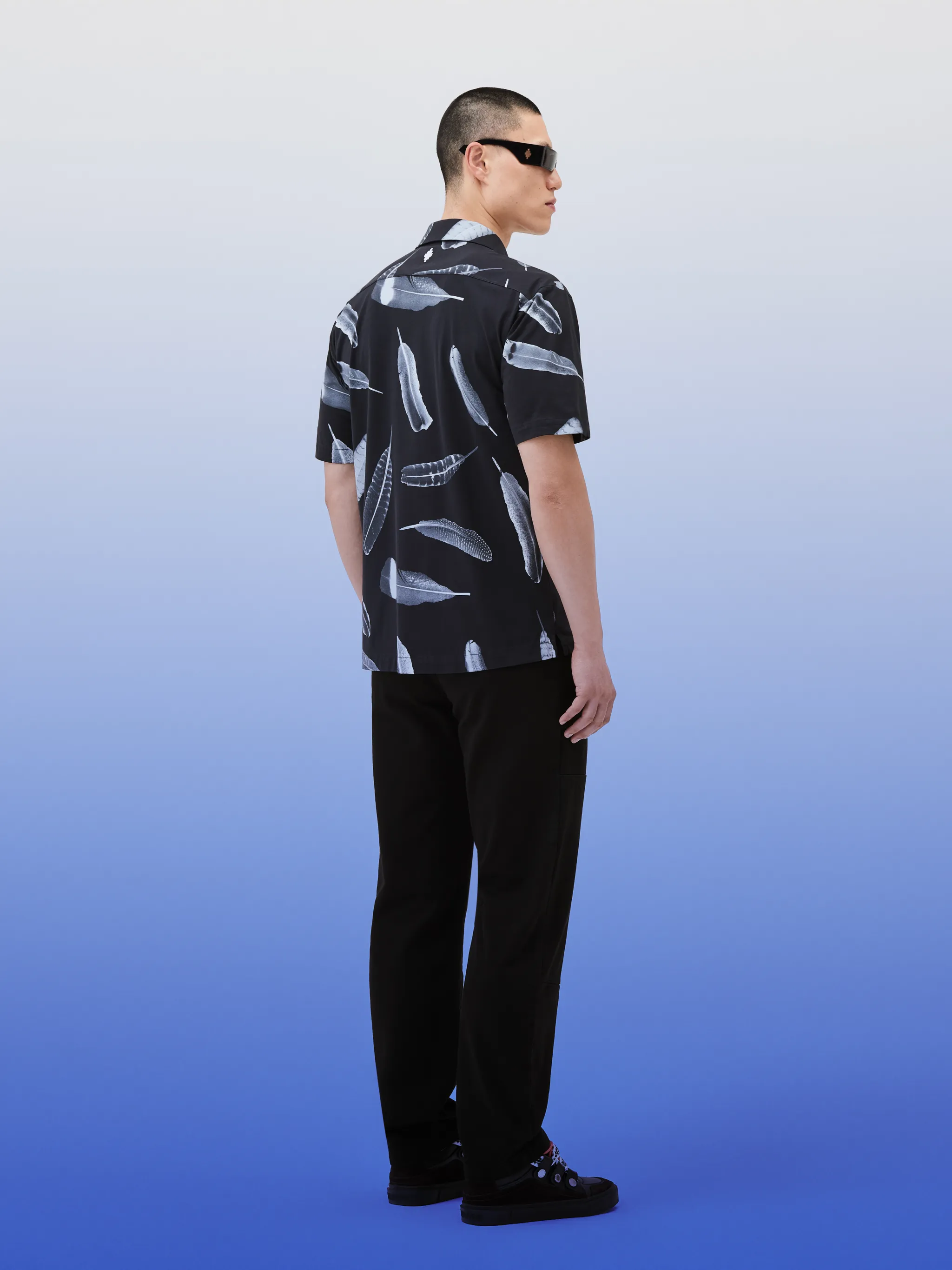 Wind Feathers-print cotton shirt from Marcelo Burlon County of Milan featuring black/white, cotton, feather print, Cuban collar, front button fastening, short sleeves, chest patch pocket and straight hem.