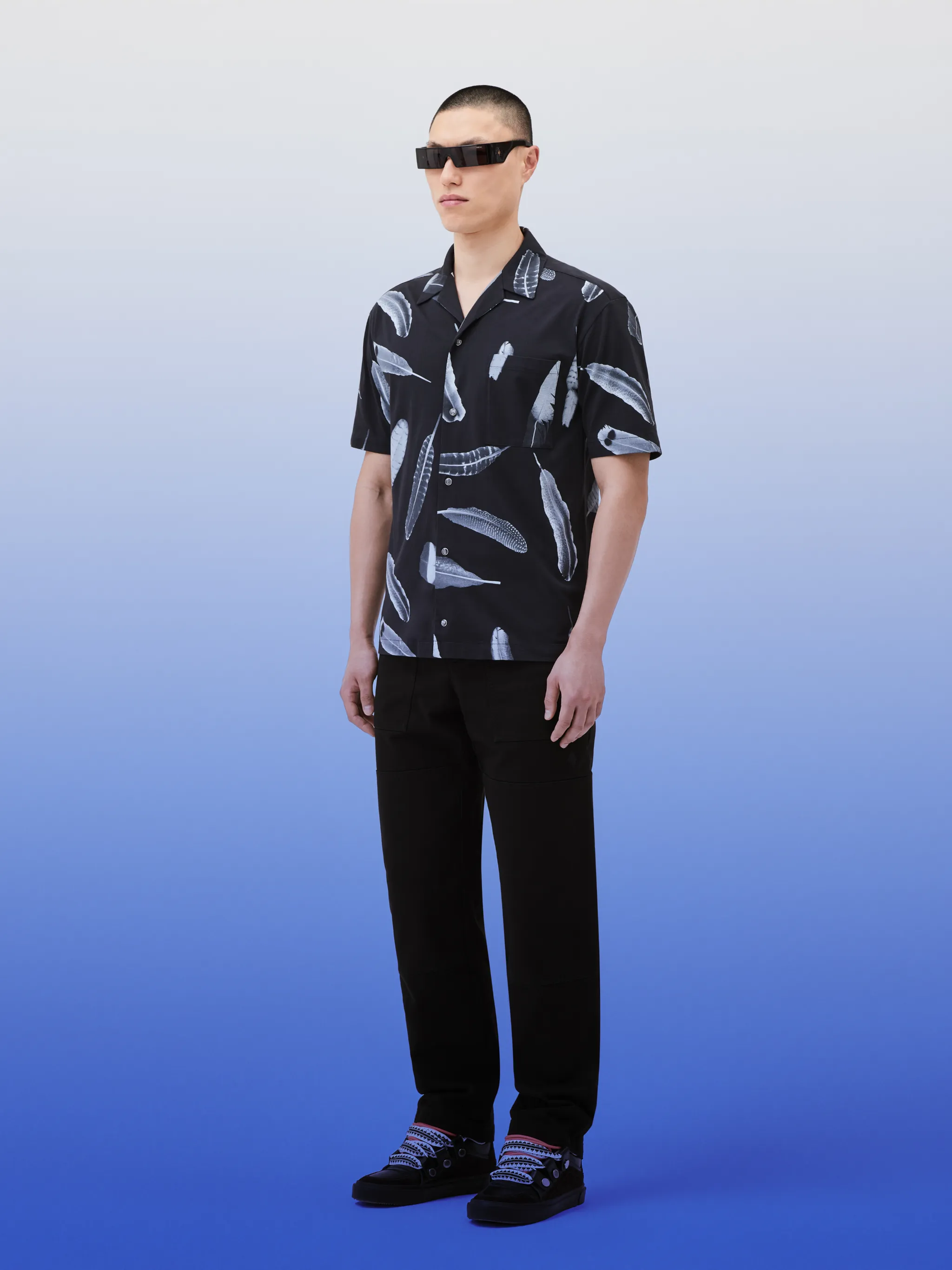 Wind Feathers-print cotton shirt from Marcelo Burlon County of Milan featuring black/white, cotton, feather print, Cuban collar, front button fastening, short sleeves, chest patch pocket and straight hem.
