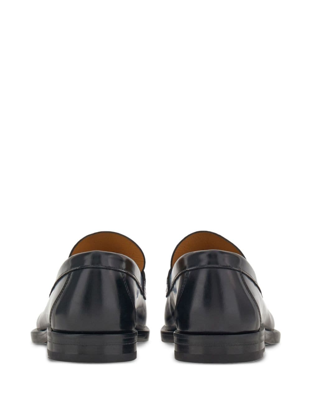 Shop Ferragamo Logo-embossed Leather Loafers In Black