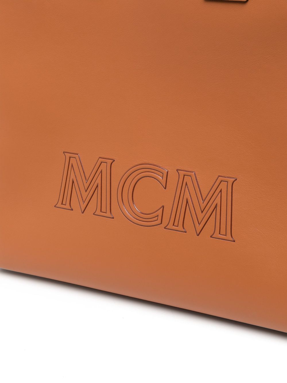 Shop Mcm Large Klassik Embossed-logo Tote Bag In Brown