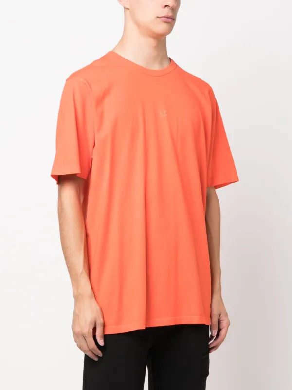 Tシャツ・カットソー C.P. Company T-shirt con logo e stampa Orange C.P. Company logo-print Cotton T-shirt | Orange | FARFETCH GE