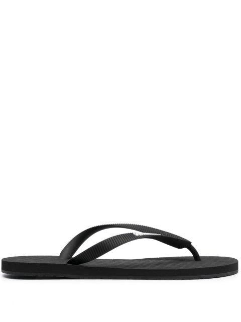 VETEMENTS logo-embossed flip flops