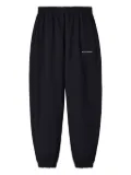 MONOCHROME logo-print cotton track pants - Black