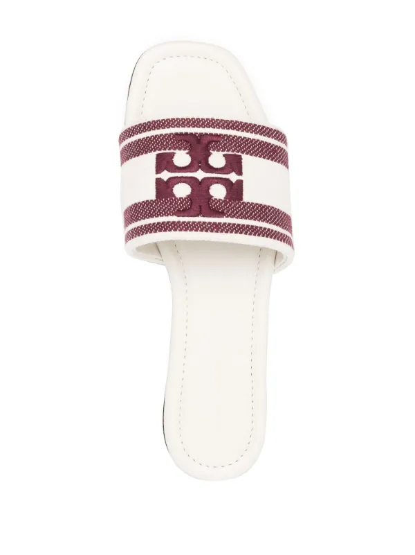 Tory burch store logo slides