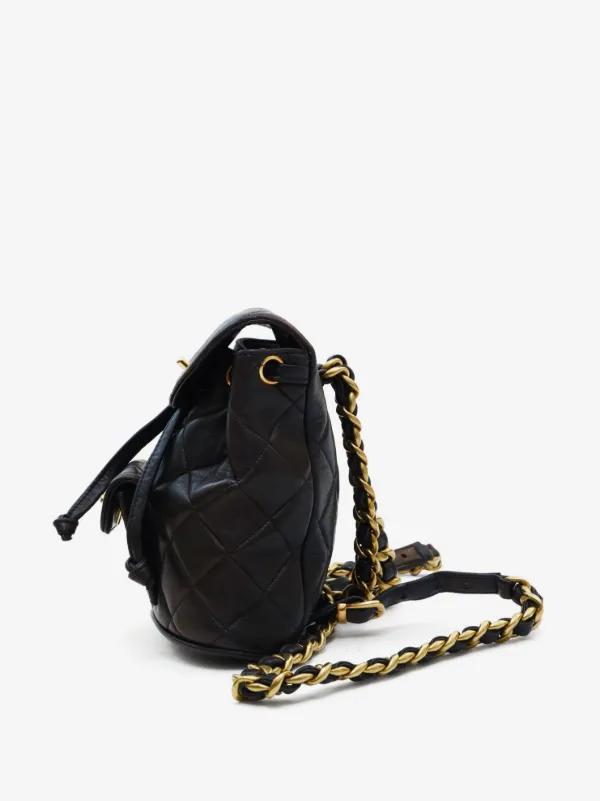 chanel mini backpack vintage Black quilted lamb leather 9 width x 8.25 height x 4.75 depth x 2.5 handle dropCondition Chanel '2025 Classic Mini Backpack'