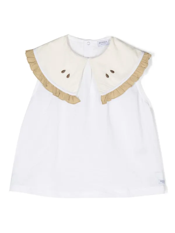 white sleeveless blouse with peter pan collar