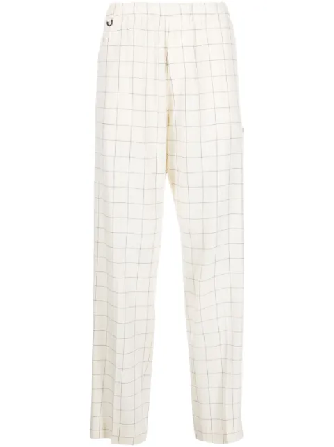 Undercover pantalones anchos con estampado
