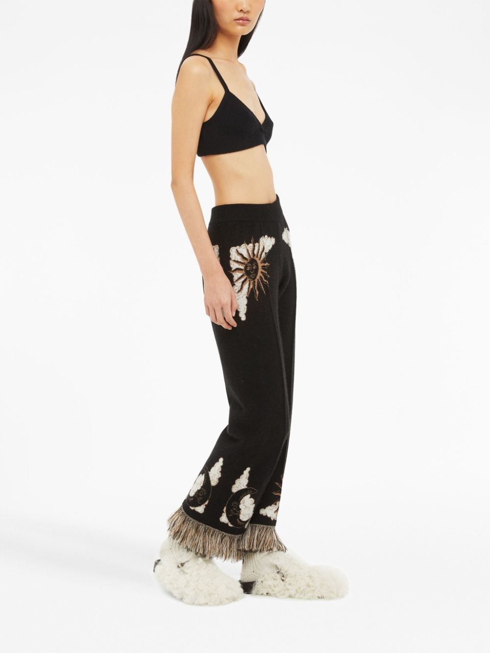 Shop Alanui The Twelve Signs Knitted Trousers In Black