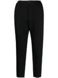 Black Comme Des Garçons chevron-pattern tapered trousers