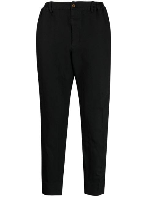 Black Comme Des Garçons chevron-pattern tapered trousers 