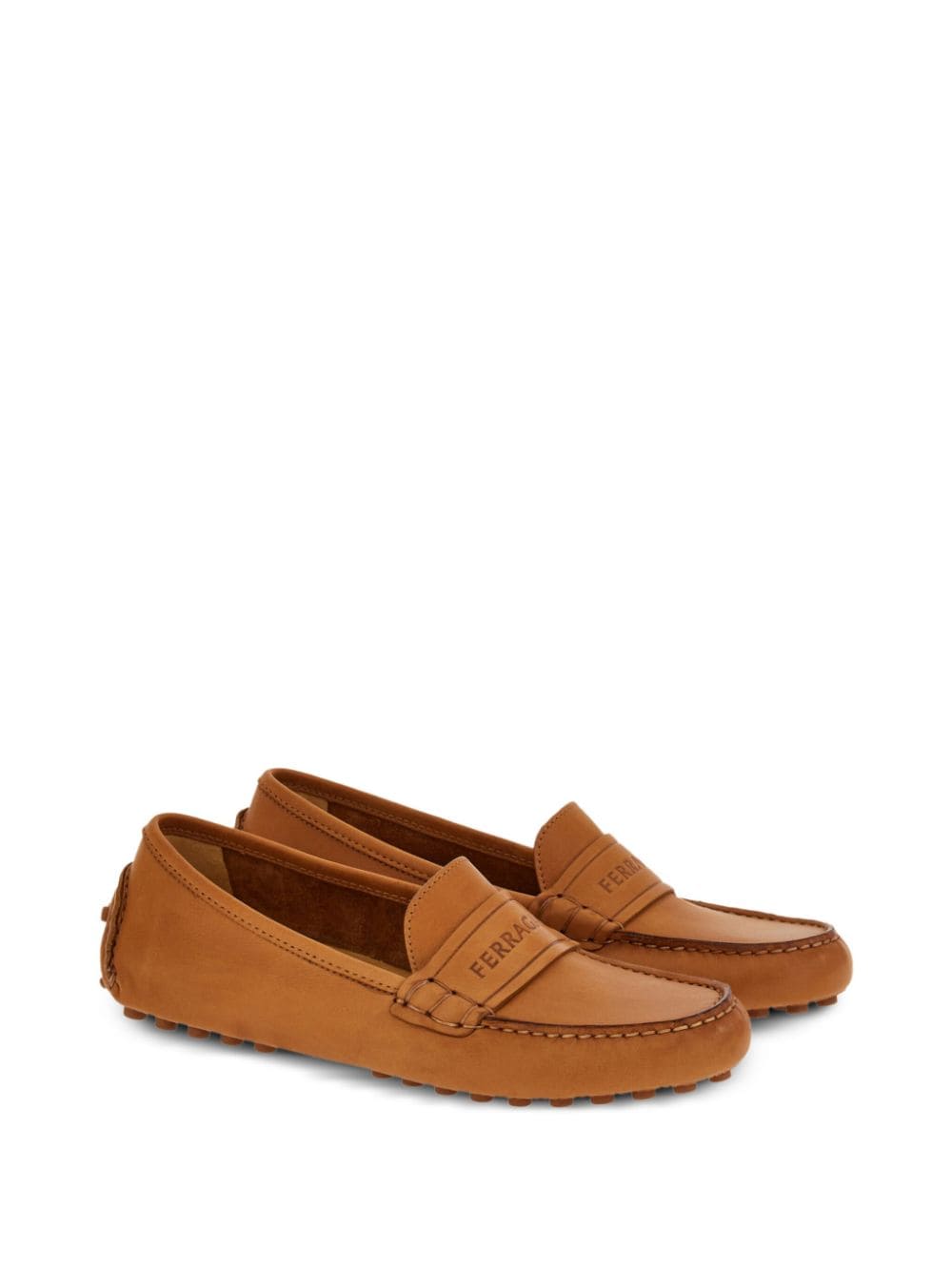 Shop Ferragamo Driver Logo-debossed Leather Loafers In Brown